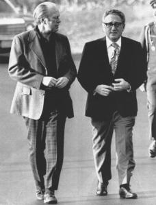 Gerald Ford walking with Secretary of State Henry Kissinger-to-Camp-David